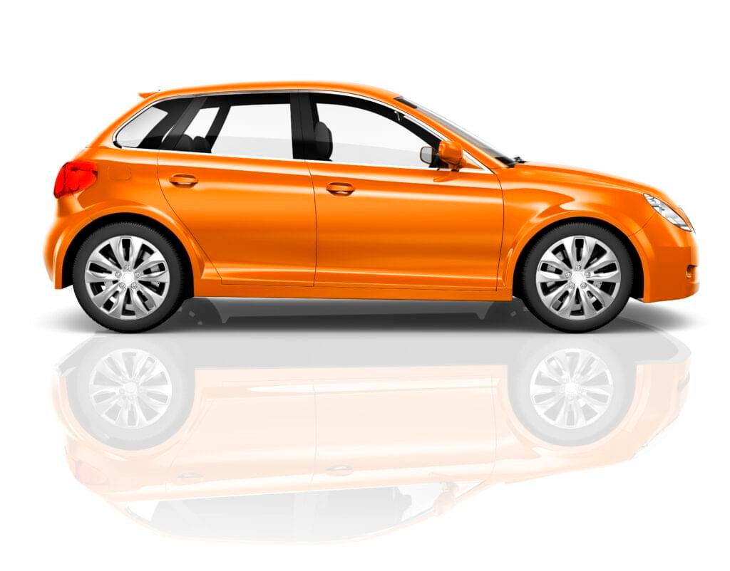 studio photo of an orange sedan in a white background